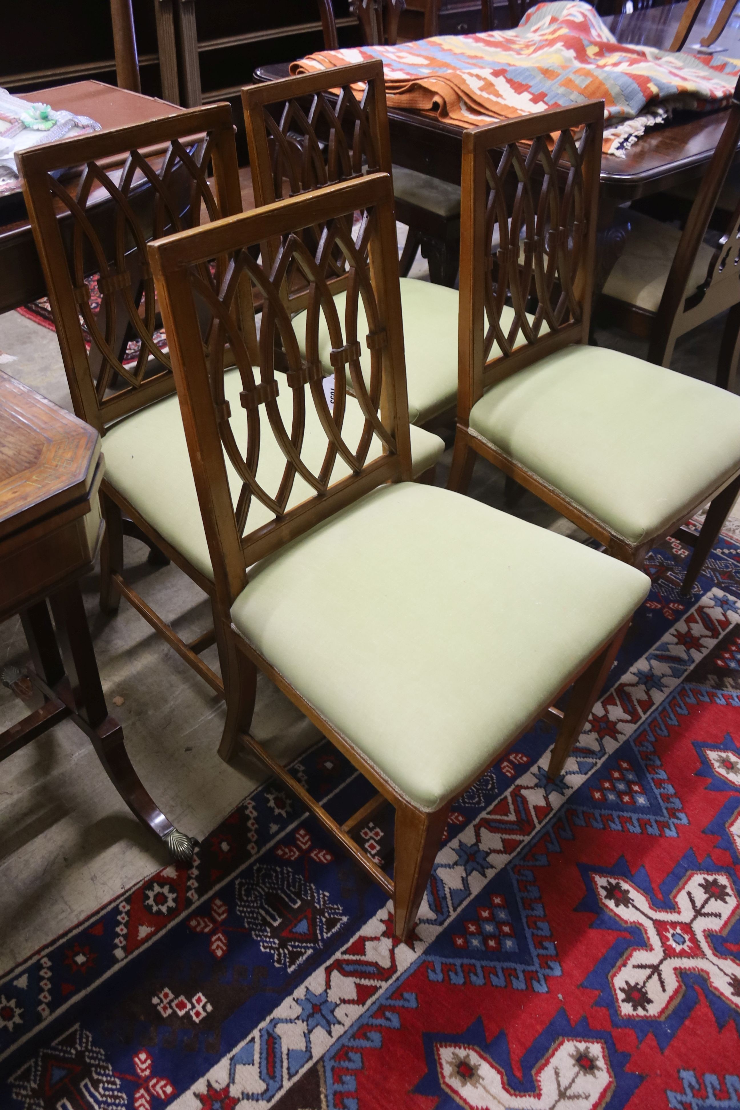 A set of four 19th century Italian walnut dining chairs (damage)